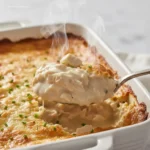 Spoon lifting a serving of Easy Low Carb Chicken Casserole
