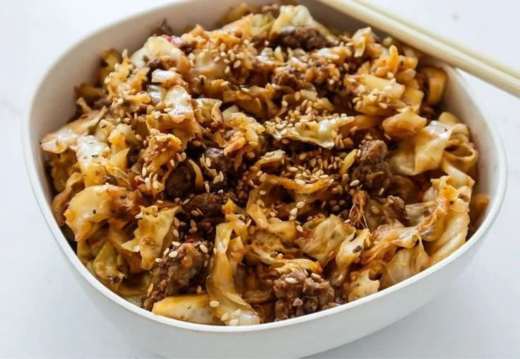 A collection of quick and easy low carb high protein meals on a wooden table