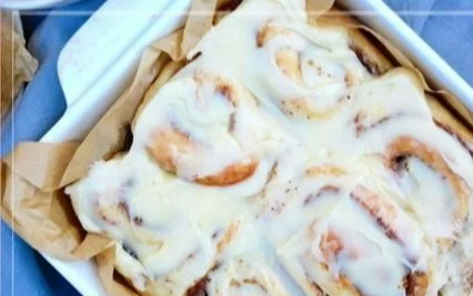 Fluffy homemade soft cinnamon roll with cream cheese frosting