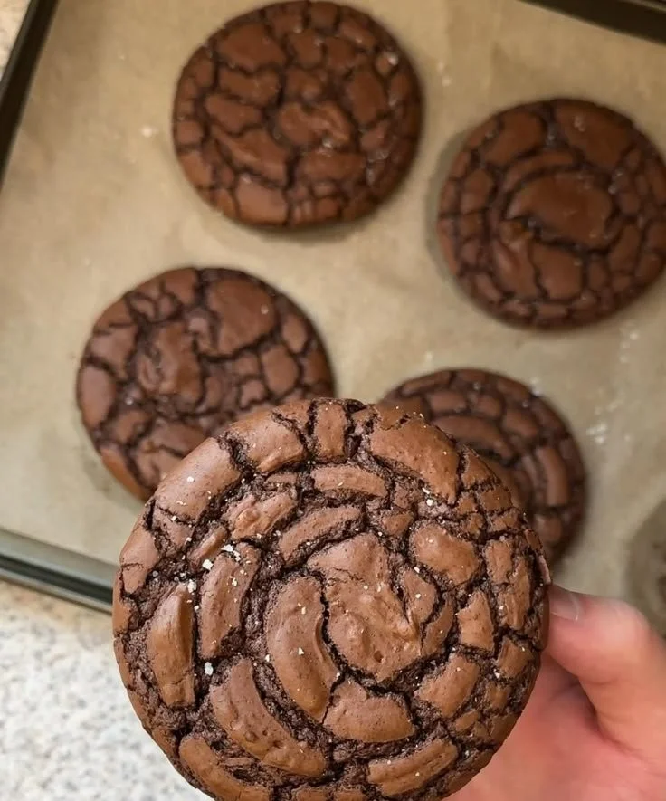 Delicious homemade brownie cookies stacked on a plate.