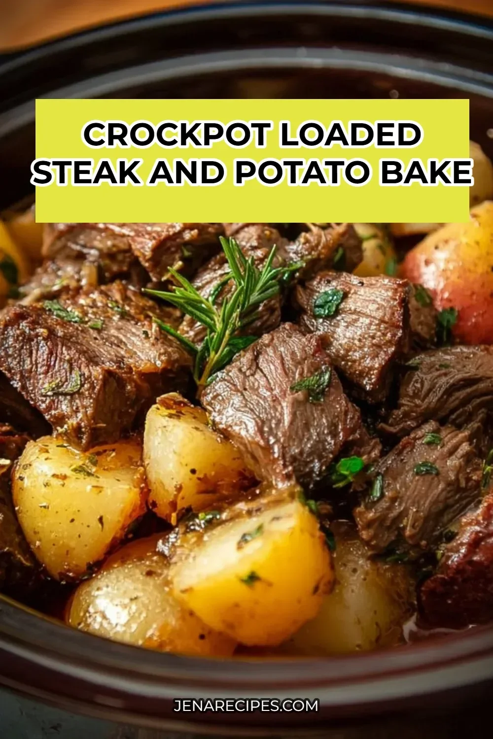 Crockpot loaded steak and potato bake garnished with fresh herbs.