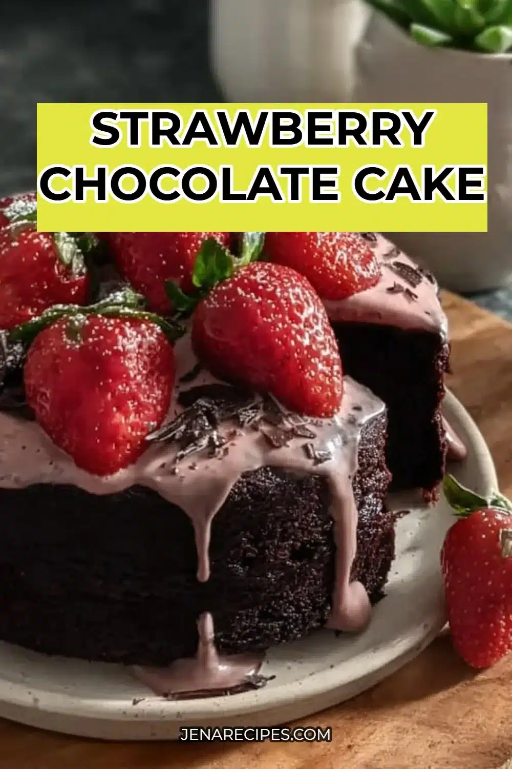 Delicious Strawberry Chocolate Cake topped with fresh strawberries and chocolate ganache.