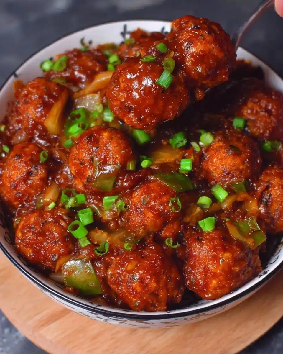 Delicious Cabbage Manchurian served in a bowl with vibrant colors.