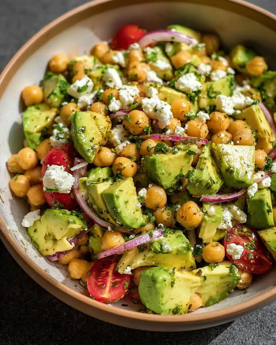 Chickpea Feta Avocado Salad with fresh ingredients in a bowl